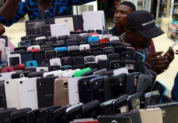 Image result for kenyans using smartphones