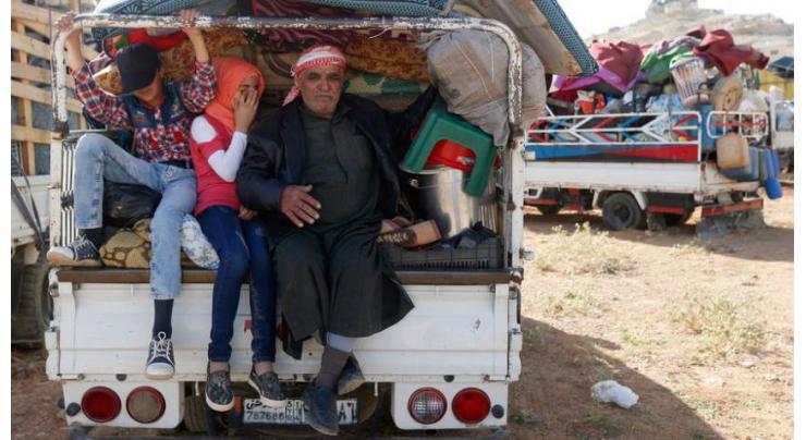 About 870 Syrian Refugees Return Home From Abroad Over Past 24 Hours - Russian Military