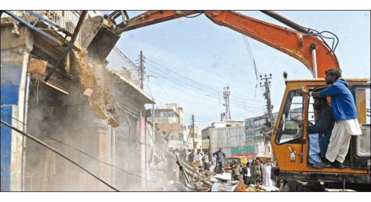 Anti-encroachment drive continues amid tight security in Karachi
