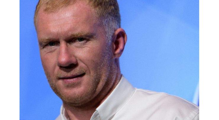 Former United star Scholes charged with betting offences
