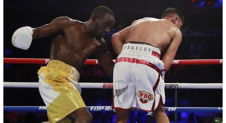 Amir Khan beaten by Terence Crawford after low blow