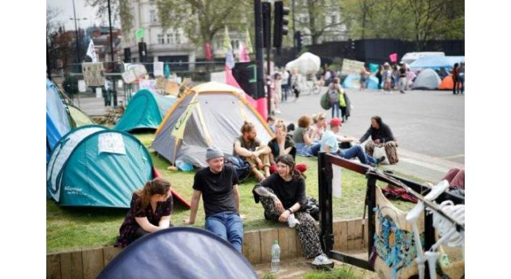 Climate change protesters halt London street blockade
