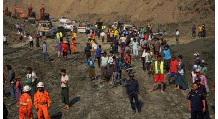 Rescuers battle to find dozens killed in Myanmar mudslide

