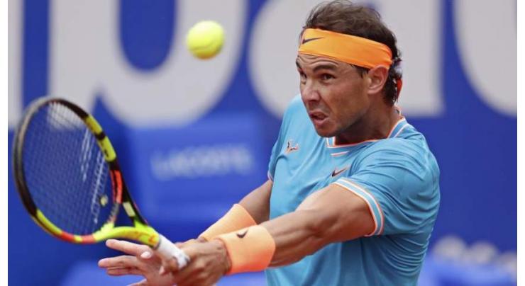 Nadal sees off tearful Ferrer to reach last eight in Barcelona

