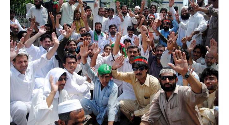 PTI workers hold protest against party leader