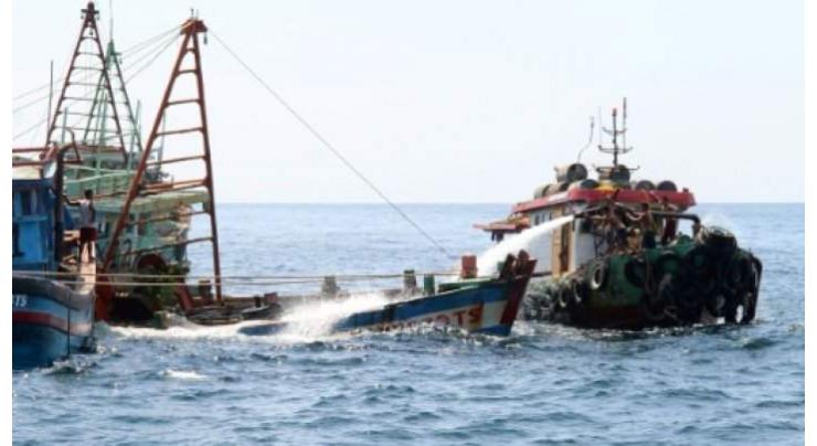 Indonesia to sink scores of boats to deter illegal fishing
