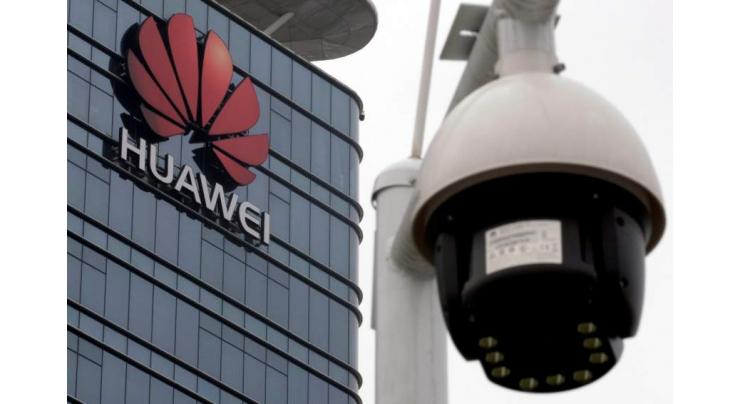 Huawei chairman says ready to sign 'no-spy' deal with UK

