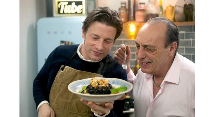 Celebrity chef Jamie Oliver serves time on restaurants

