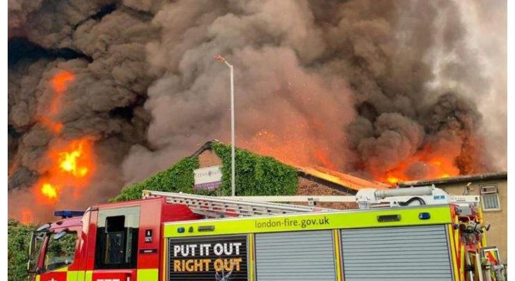 About 100 Firefighters Tackling Warehouse Fire North of London - Fire Brigade