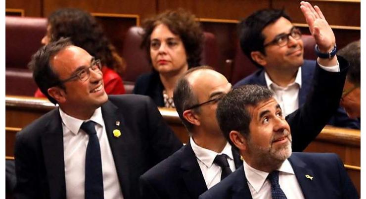 Spanish parliament suspends four jailed Catalan MPs
