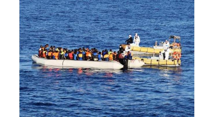 Italian navy takes rescued migrants to Genoa
