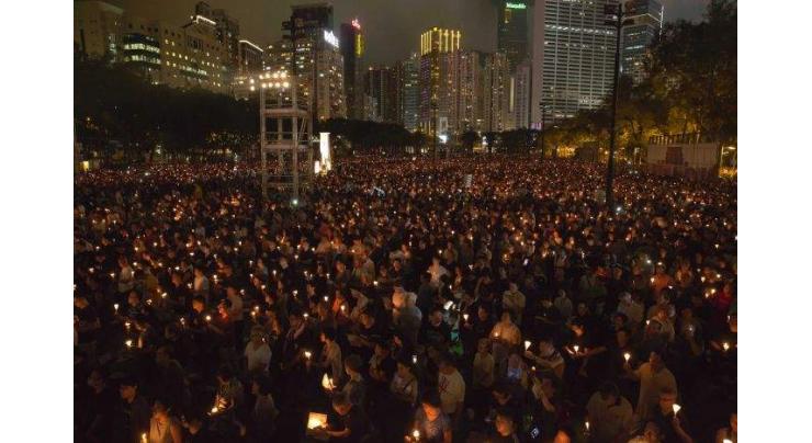 Mainlanders defy authorities to attend Hong Kong Tiananmen vigil
