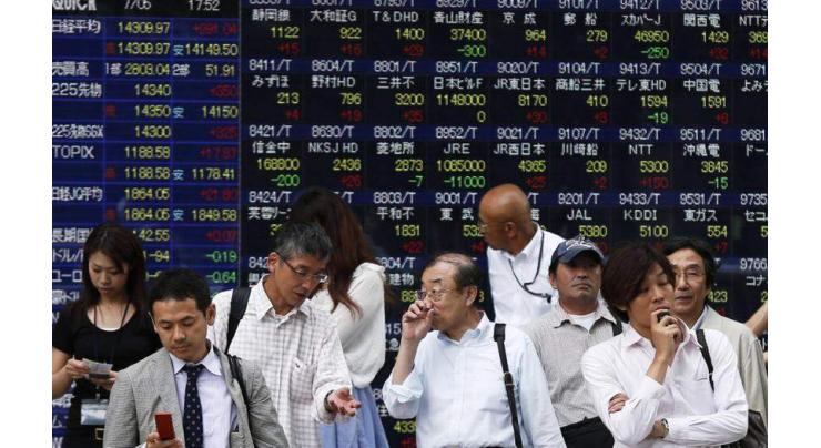 Tokyo stocks close lower amid lingering concern over trade 18 June 2019
 