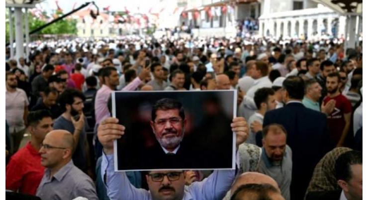 Erdogan attends prayers for Egypt's ex-president Morsi
