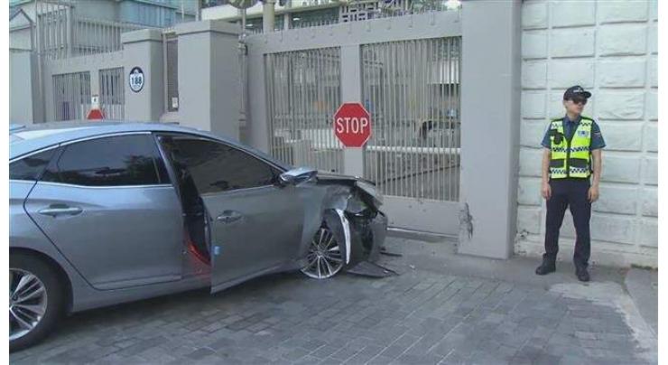 Man arrested after car rams US embassy gate in South Korea
