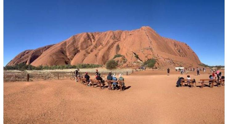 Tourist rush at Australia's Uluru before climb ban
