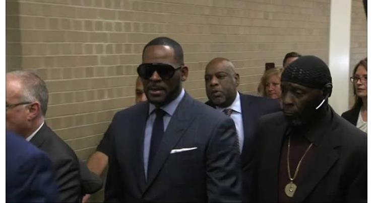 Singer R Kelly arrested in Chicago on federal sex crime charges