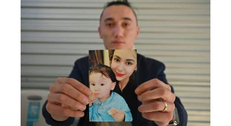 Australia calls on China to let Uighur mother and son leave
