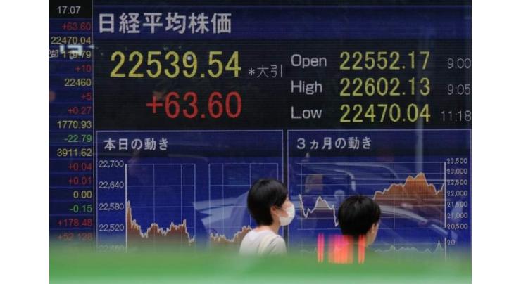 Tokyo stocks open lower as yen edges higher
