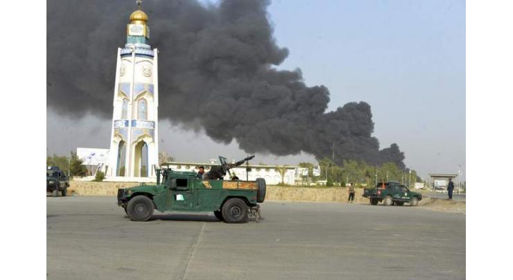 At least 11 dead in Taliban attack on Afghan police HQ
