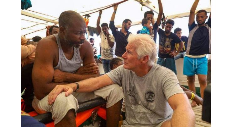 80 more migrants rescued as Richard Gere shines light on plight
