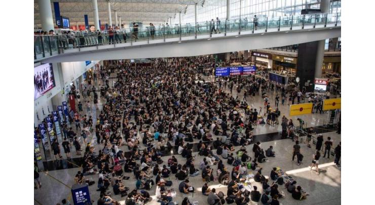 Hong Kong Protesters Defend Airport Chaos