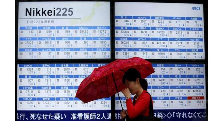 Asian markets mostly rise as dealers absorb positive news

