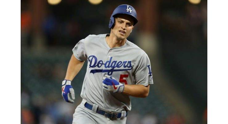 Seager shines as Dodgers clinch 7th straight NL West title
