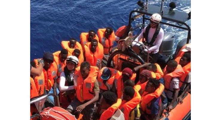 New Italy government lets rescued migrants disembark
