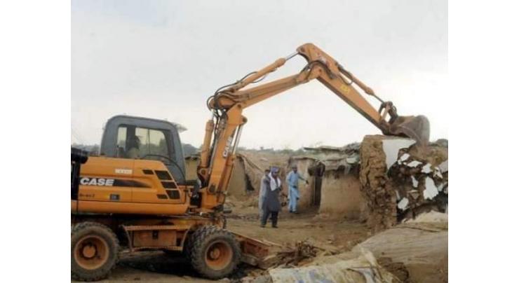 Illegal constructions demolished during operation in Multan
