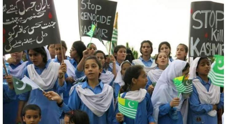 Female teachers, students stage rally to express solidarity with women of IOK
