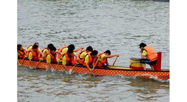 China,Singapore claim wins in world university dragon boat invitational race
