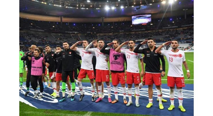 German regional clubs probed after players mimic Turkish military salute
