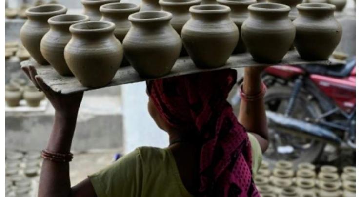 Earth and fire: India pottery village lights up for Diwali
