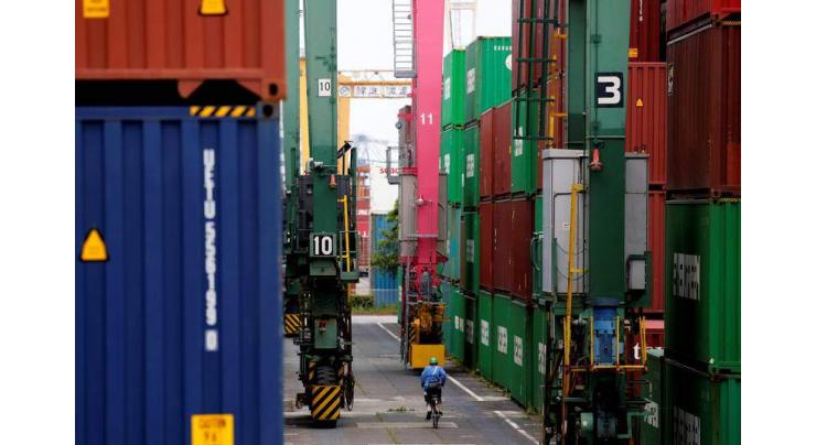 Japan lowers economic view for Ist time in 5 months on protracted slump in exports
