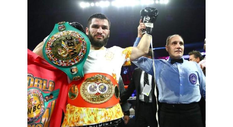Russia's Beterbiev stops Gvozdyk to unify two titles
