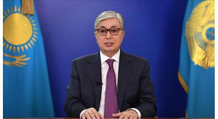 Kazakh president hands key powers to predecessor Nazarbayev
