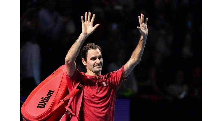Federer celebrates 1,500th match with Basel breeze
