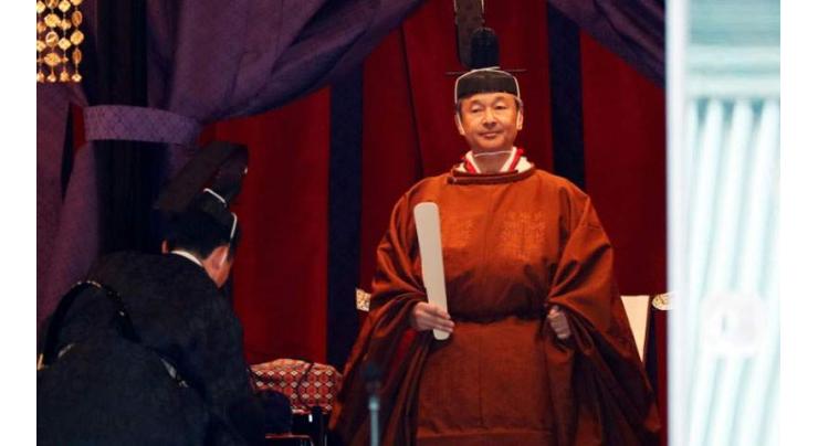 Japan's emperor completes enthronement in ancient ceremony
