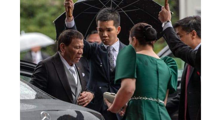 Philippines' Duterte cuts short Japan trip in 'unbearable pain'
