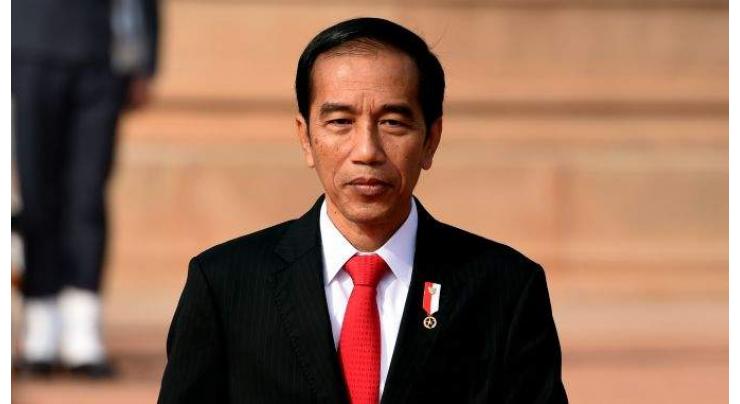 Indonesia's Jokowi taps election archrival for defense minister
