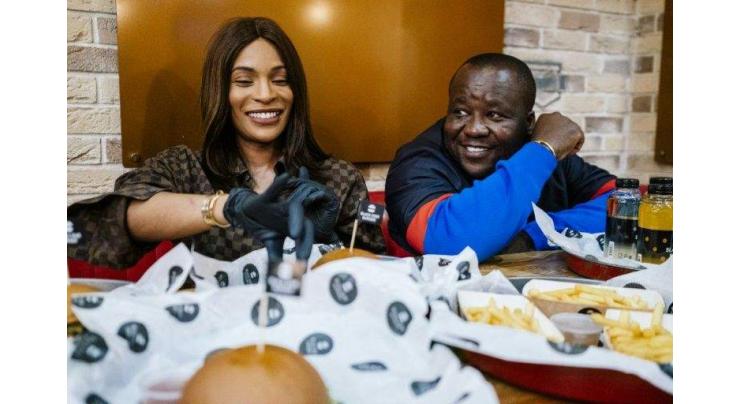 With music and burger empire, Cameroon couple living 'Russian dream'
