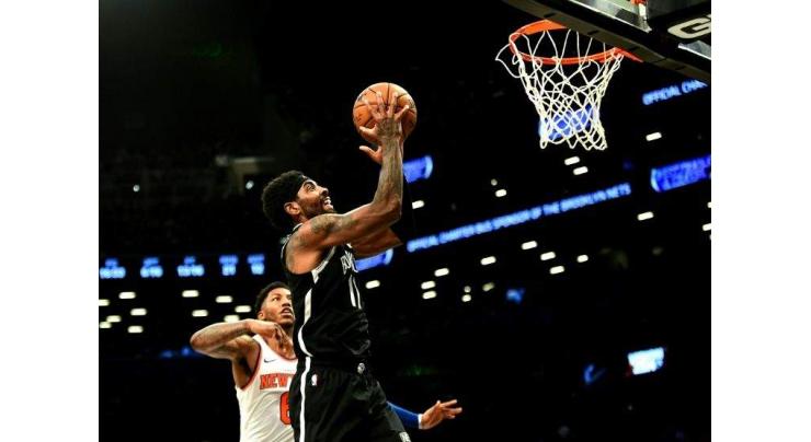 Irving, Nets hold off Knicks in Big Apple NBA battle, Lakers win
