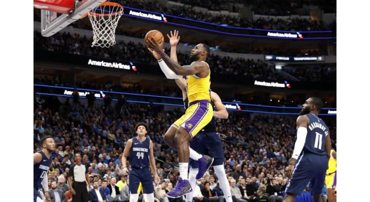 James powers Lakers to overtime win against Mavs
