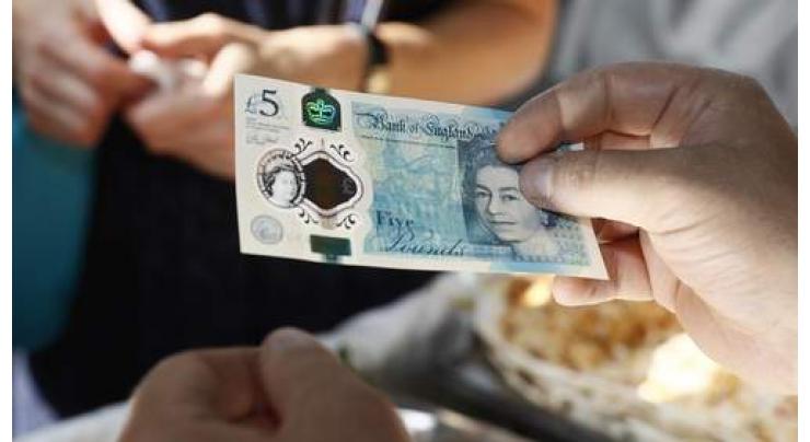 UK inflation falls faster than expected in October
