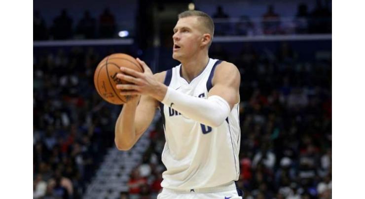 Knicks beat Mavs as Porzingis booed in his first game back
