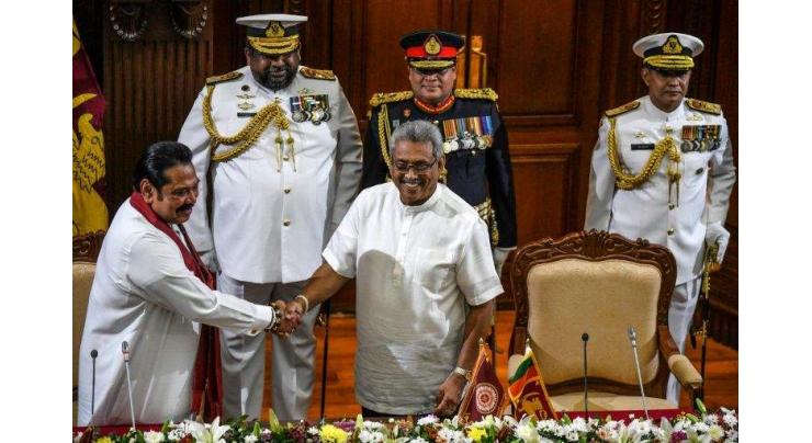 Sri Lanka's Rajapaksa brothers back in business
