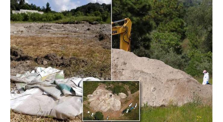 Mexican investigators find 31 bodies in secret graves
