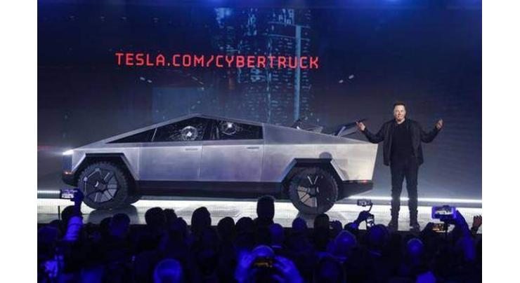 Tesla unveils 1st electric pickup truck in L.A.
