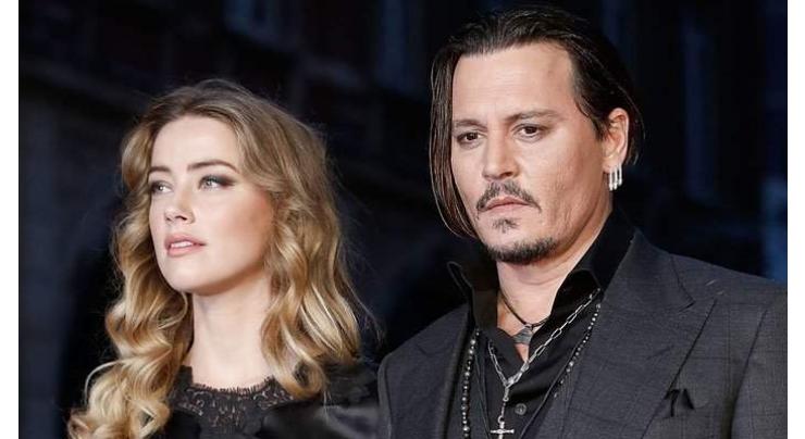 Johnny Depp was threatened to be shot by Amber Heard's father, reveals insider